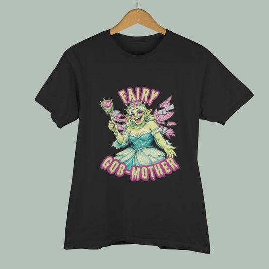 a black goblincore unisex tee shirt with a green goblin wearing abled wig and pink fairy wings waving a slimy wand.  The goblin woman's wings are held together with duct tape. Text reads: Fairy Gob-Mother.
